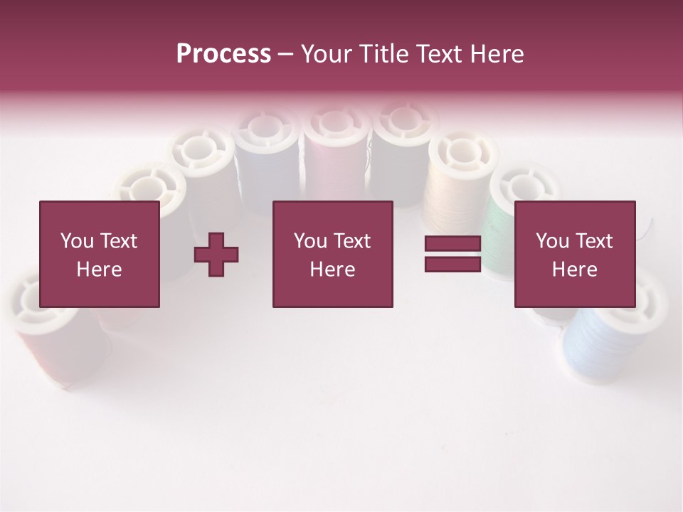 A Group Of Spools Of Thread On A White Surface PowerPoint Template