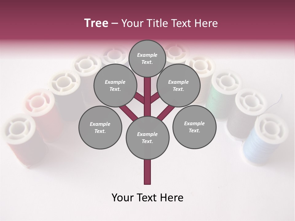 A Group Of Spools Of Thread On A White Surface PowerPoint Template