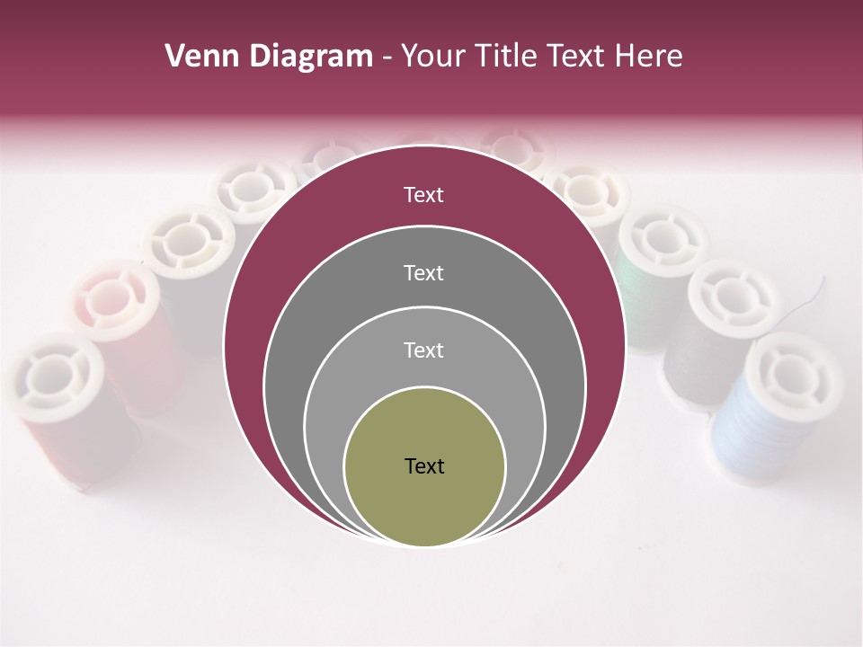 A Group Of Spools Of Thread On A White Surface PowerPoint Template