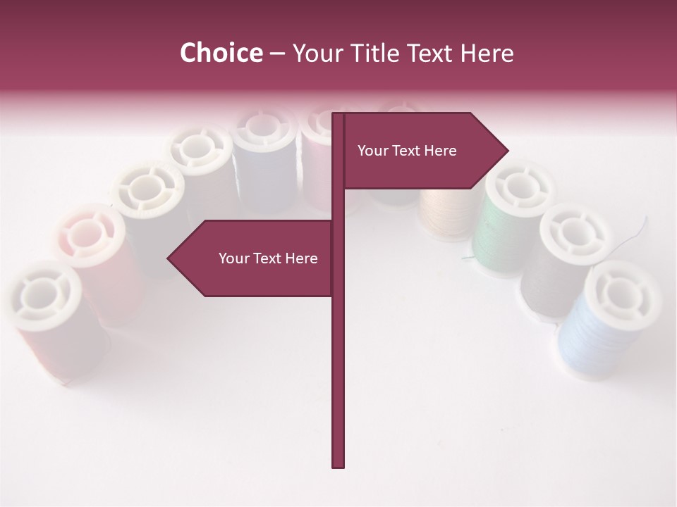 A Group Of Spools Of Thread On A White Surface PowerPoint Template