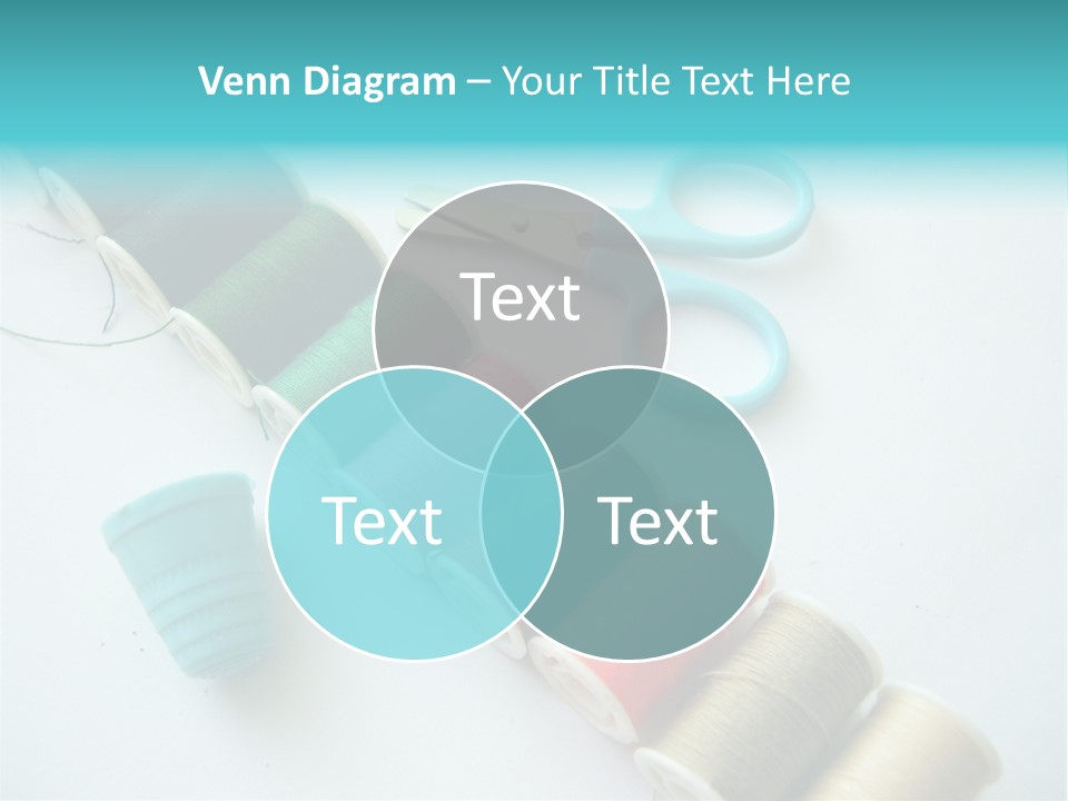 A Pair Of Scissors And Spools Of Thread On A Table PowerPoint Template