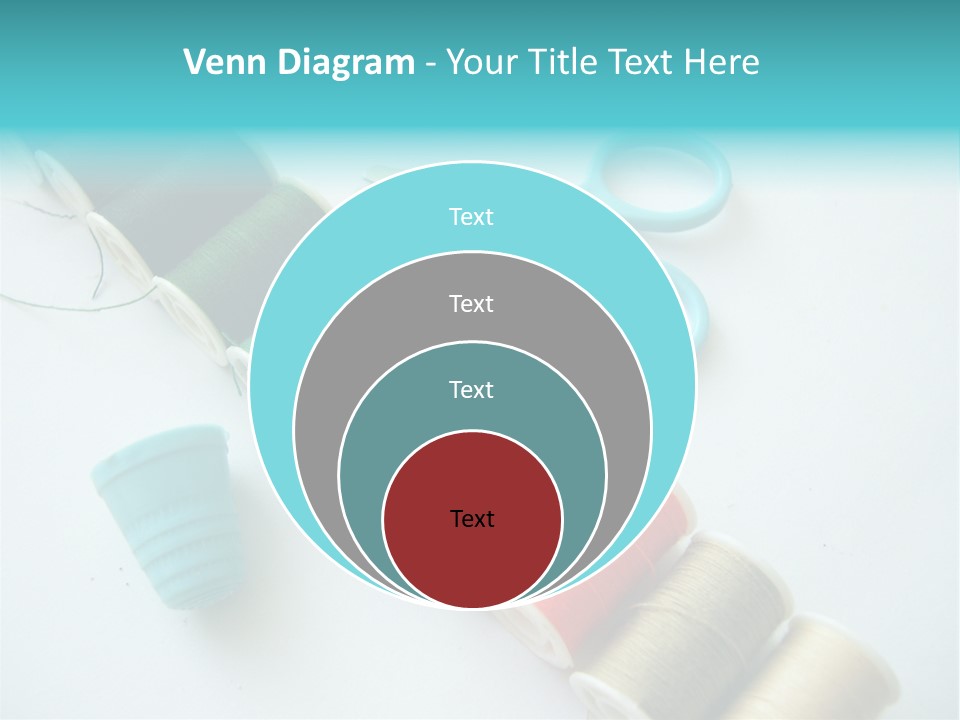 A Pair Of Scissors And Spools Of Thread On A Table PowerPoint Template