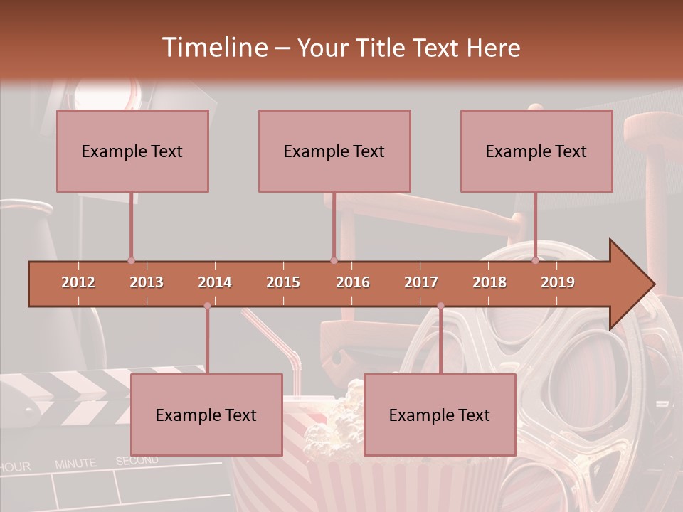 A Movie Projector And A Bucket Of Popcorn On A Table PowerPoint Template