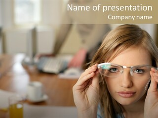 Woman Holding Up A Pair Of Glasses PowerPoint Template