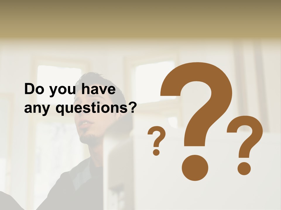 Man Sitting Behind A Computer PowerPoint Template