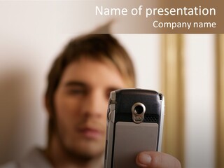 Man With Camera Phone PowerPoint Template