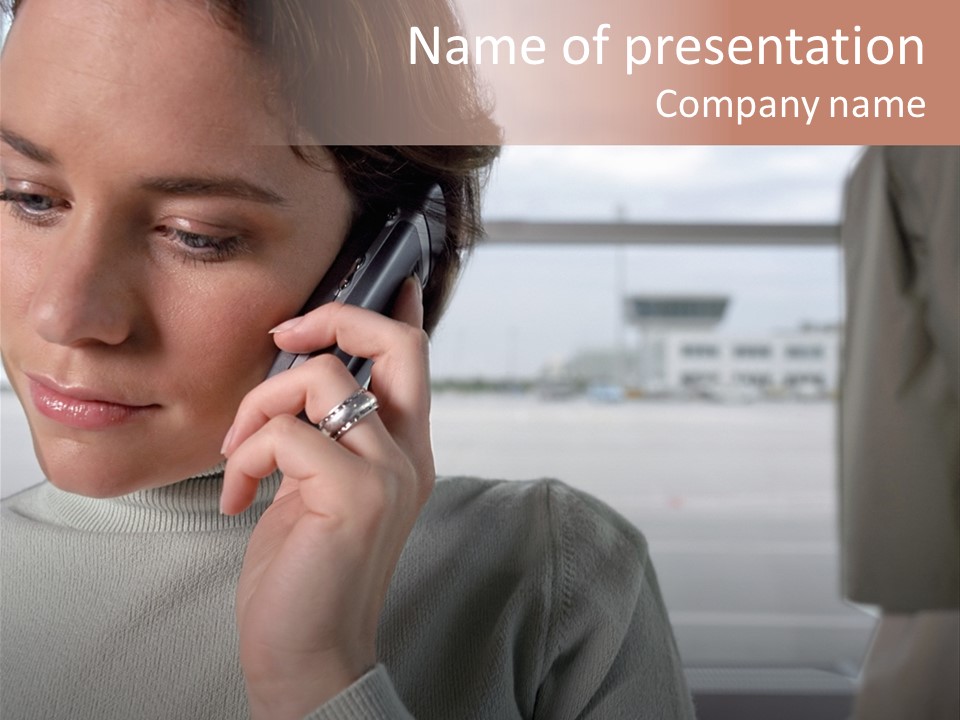 Woman Using Mobile Phone In Departure Lounge PowerPoint Template