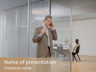 Businessman Using A Cellular Telephone PowerPoint Template