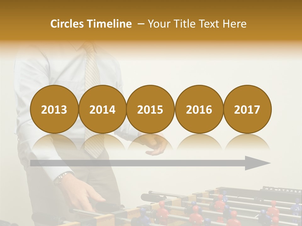 Businessman Playing Table Football PowerPoint Template