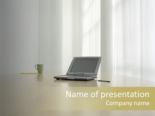 Laptop Computer On Desk PowerPoint Template