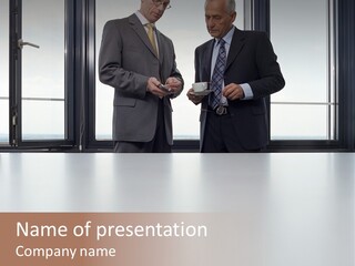 Businessmen Looking At Palmtop PowerPoint Template