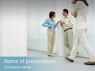 Office Workers Talking In Corridor PowerPoint Template