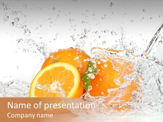 A Group Of Oranges With Water Splashing On Them PowerPoint Template
