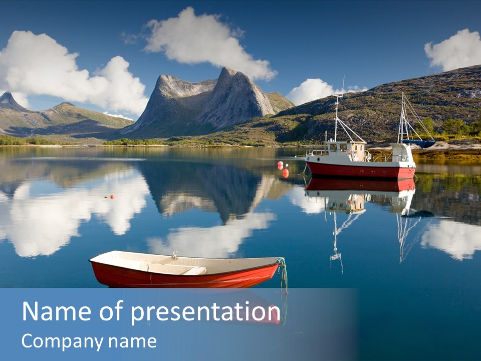 Two Boats In The Water With Mountains In The Background PowerPoint Template