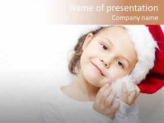 A Young Girl Wearing A Santa Claus Hat PowerPoint Template