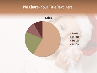 A Young Girl Wearing A Santa Claus Hat PowerPoint Template