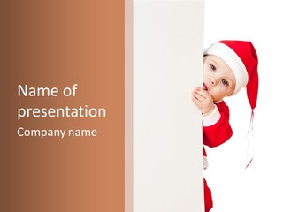 A Baby In A Santa Hat Peeking Out From Behind A Wall PowerPoint Template