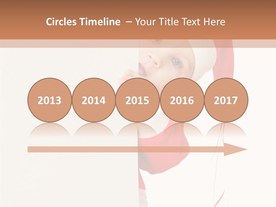 A Baby In A Santa Hat Peeking Out From Behind A Wall PowerPoint Template