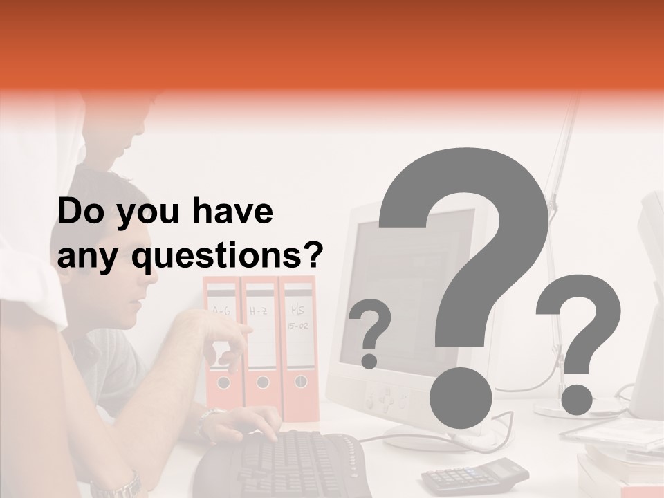 Office Workers Looking At Computer Monitor PowerPoint Template