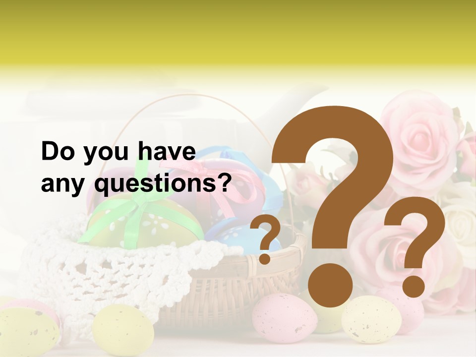 A Teapot With Flowers And Eggs On A Table PowerPoint Template