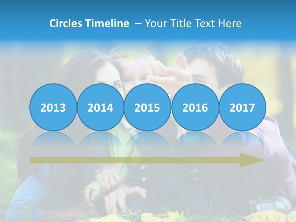 A Man And Woman Holding A Child In The Park PowerPoint Template