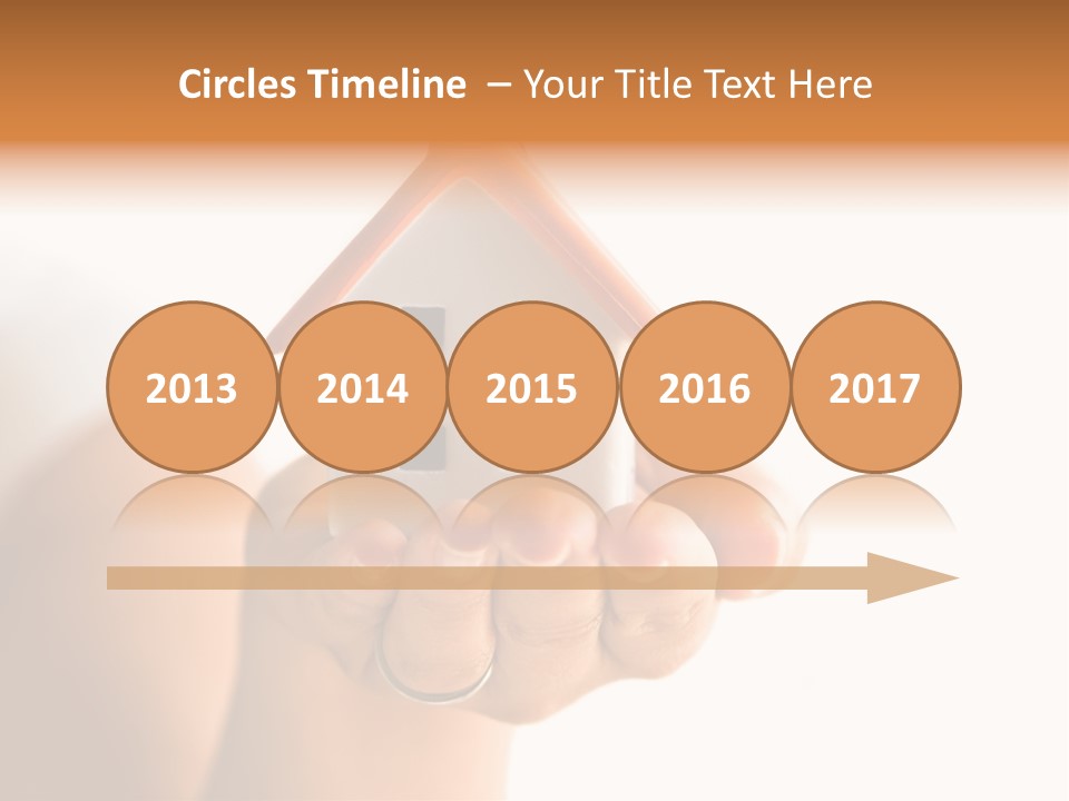 A Person Holding A Small House In Their Hands PowerPoint Template