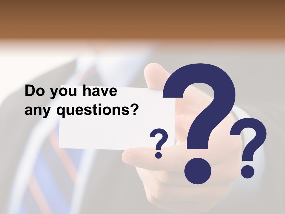 A Man In A Suit Holding A Business Card PowerPoint Template