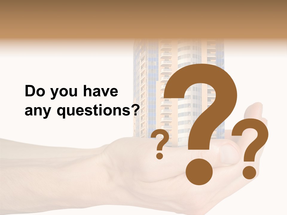 A Hand Holding A Model Of A Building PowerPoint Template