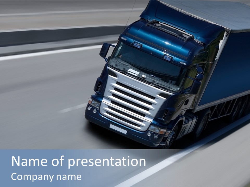 A Blue Semi Truck Driving Down A Highway PowerPoint Template