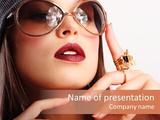 A Woman Wearing Glasses And A Hat With A Ring On Her Finger PowerPoint Template