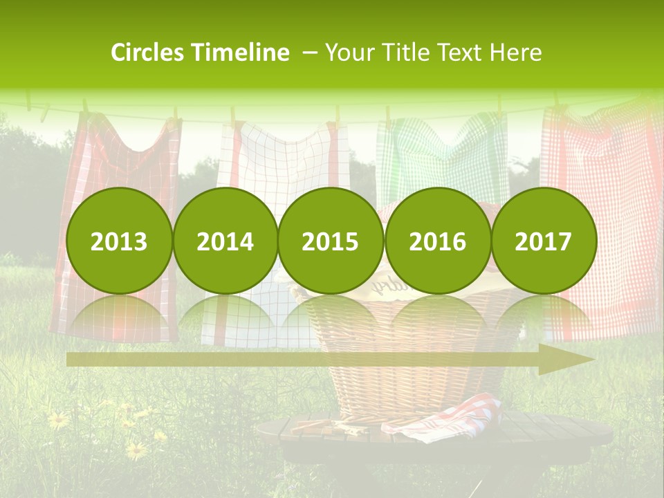 A Basket With Clothes Hanging On A Clothes Line PowerPoint Template