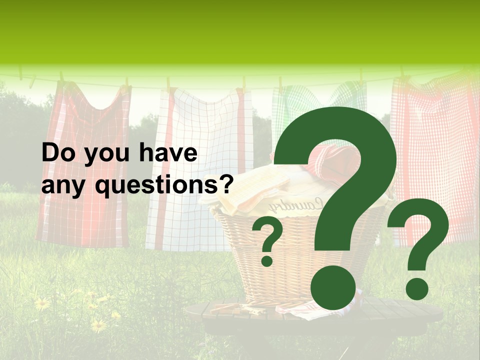 A Basket With Clothes Hanging On A Clothes Line PowerPoint Template