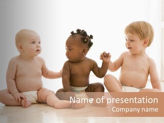 Three Babies Sitting On The Floor Playing With Each Other PowerPoint Template
