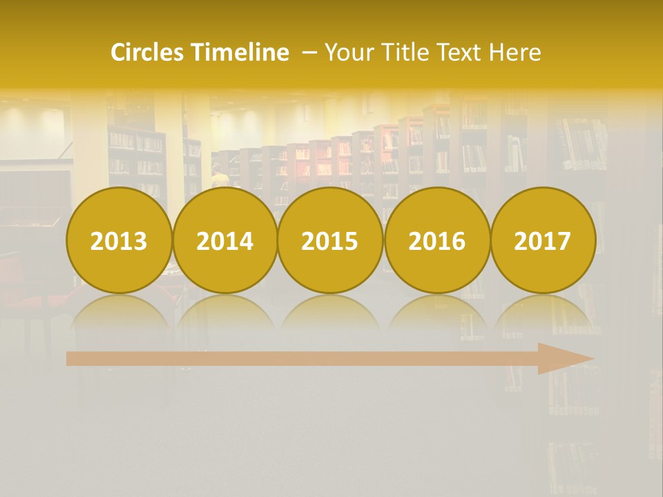 A Library Filled With Lots Of Books And Chairs PowerPoint Template