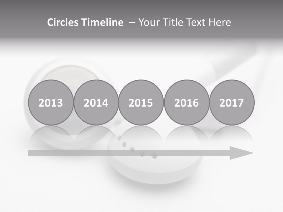 A Pair Of Headphones Sitting On Top Of A Table PowerPoint Template