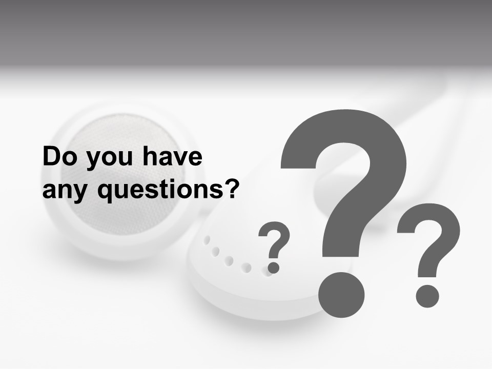 A Pair Of Headphones Sitting On Top Of A Table PowerPoint Template