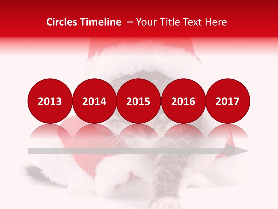 A Cat Wearing A Santa Hat With Green Eyes PowerPoint Template