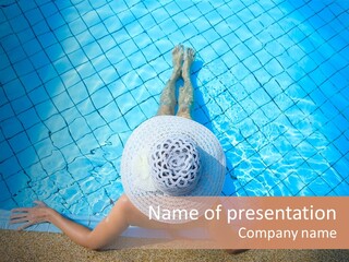 A Woman In A Hat Laying On The Side Of A Swimming Pool PowerPoint Template