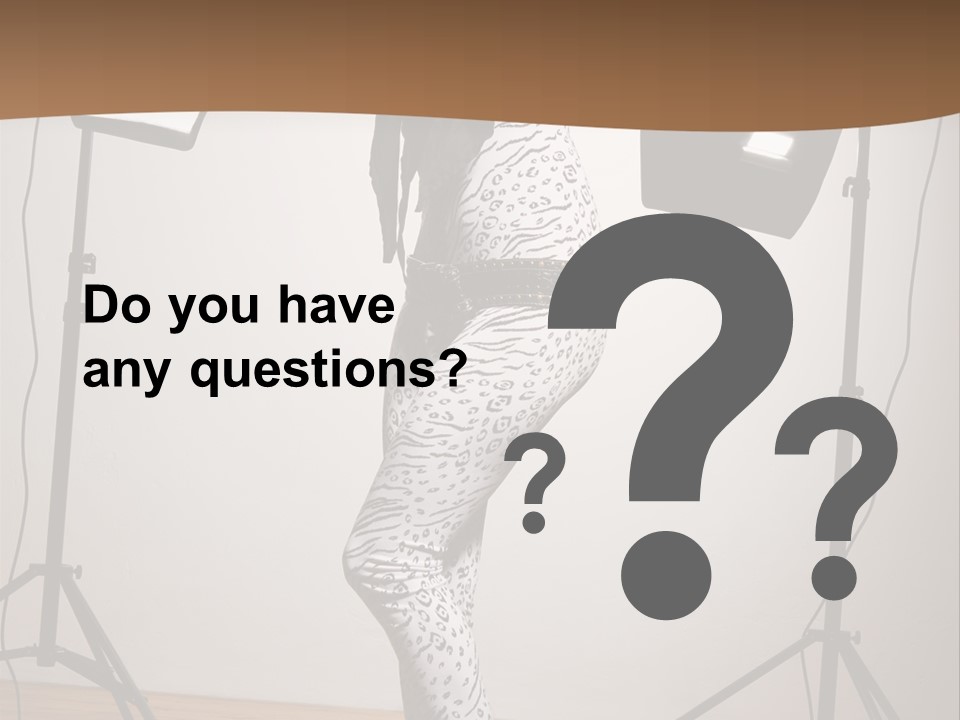 A Woman Is Posing In Front Of A Camera PowerPoint Template