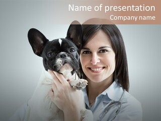 A Woman Holding A Small Dog In Her Arms PowerPoint Template