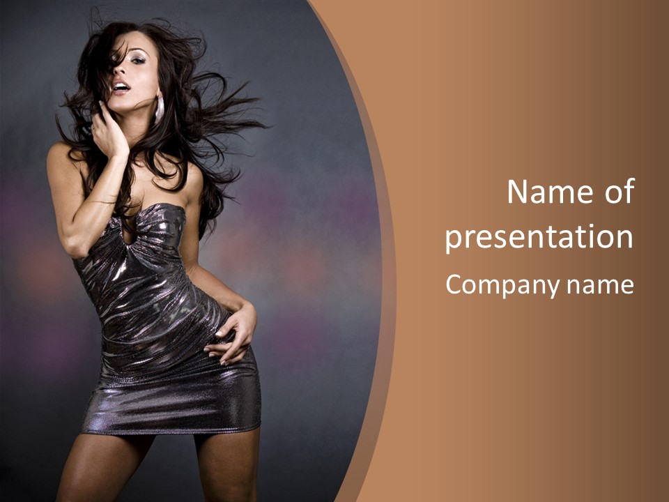 A Woman In A Silver Dress Posing For A Picture PowerPoint Template