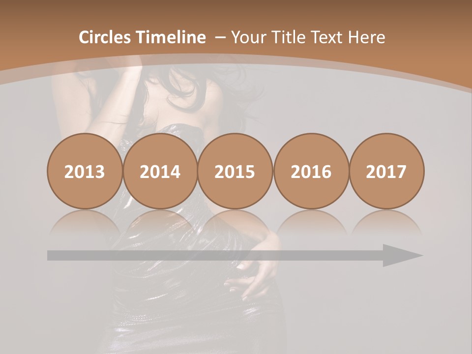 A Woman In A Silver Dress Posing For A Picture PowerPoint Template