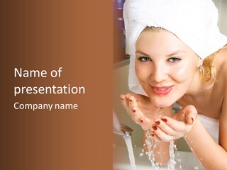 A Woman In A Towel On Her Head Is Washing Her Hands PowerPoint Template