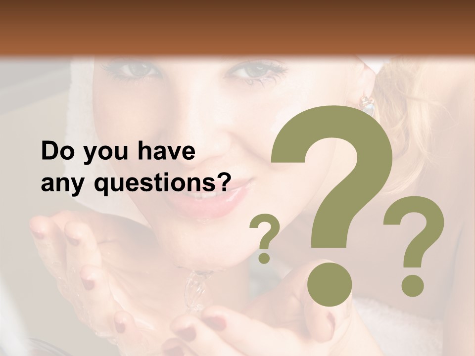 A Woman In A Towel On Her Head Is Washing Her Hands PowerPoint Template