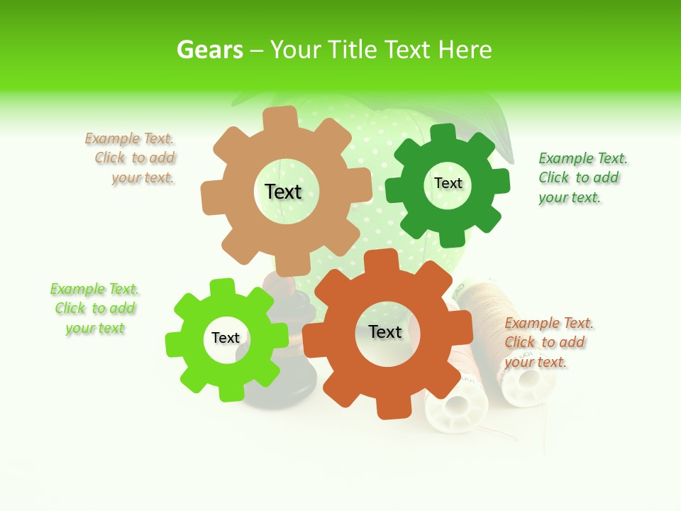 A Green Apple Sitting Next To Two Spools Of Thread PowerPoint Template