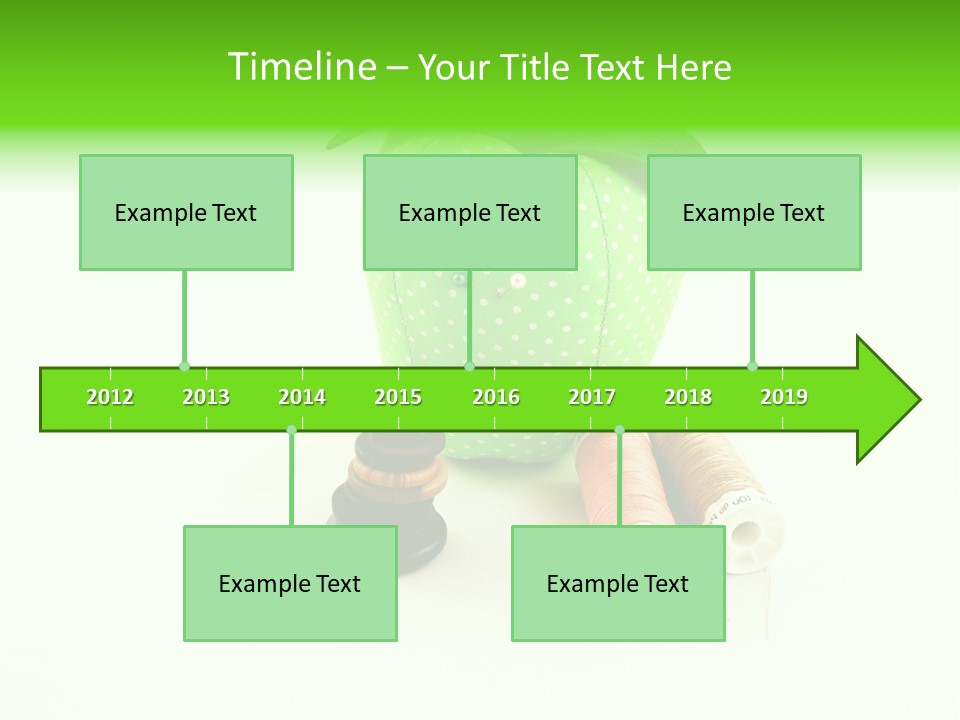 A Green Apple Sitting Next To Two Spools Of Thread PowerPoint Template