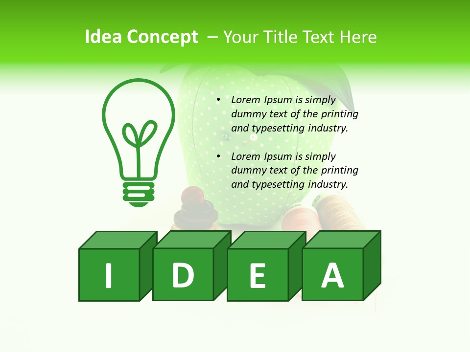 A Green Apple Sitting Next To Two Spools Of Thread PowerPoint Template
