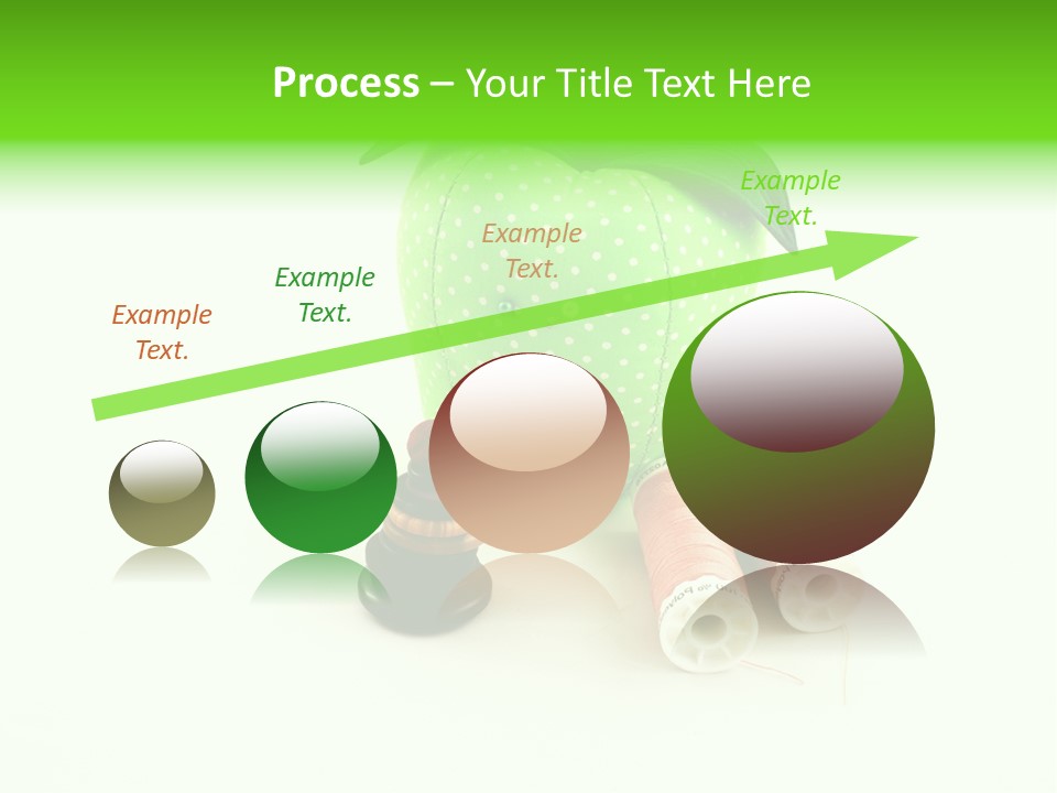 A Green Apple Sitting Next To Two Spools Of Thread PowerPoint Template