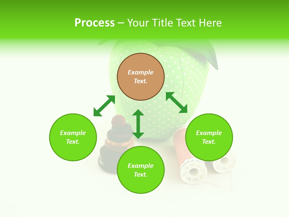 A Green Apple Sitting Next To Two Spools Of Thread PowerPoint Template