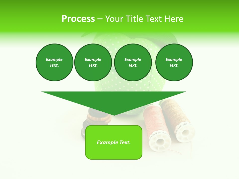 A Green Apple Sitting Next To Two Spools Of Thread PowerPoint Template